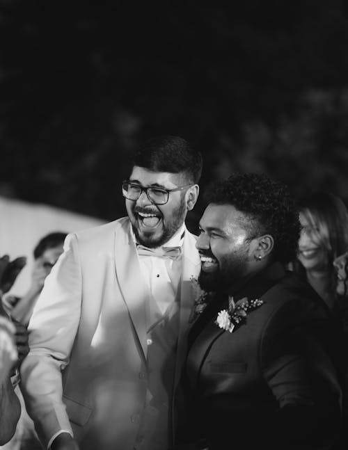 Smiling Men in Wedding Suits