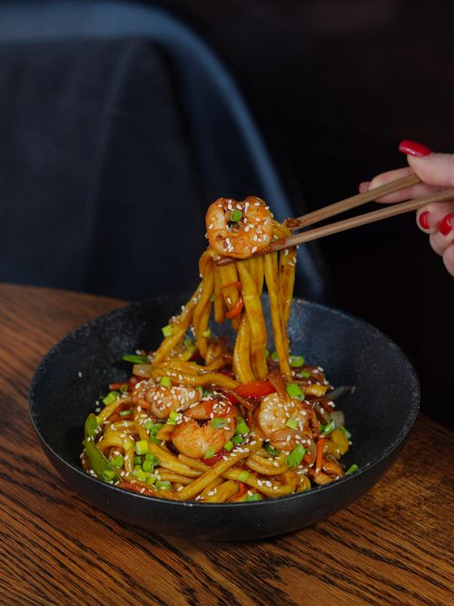 Free A delicious bowl of shrimp noodles captured with vibrant colors and textures. Stock Photo