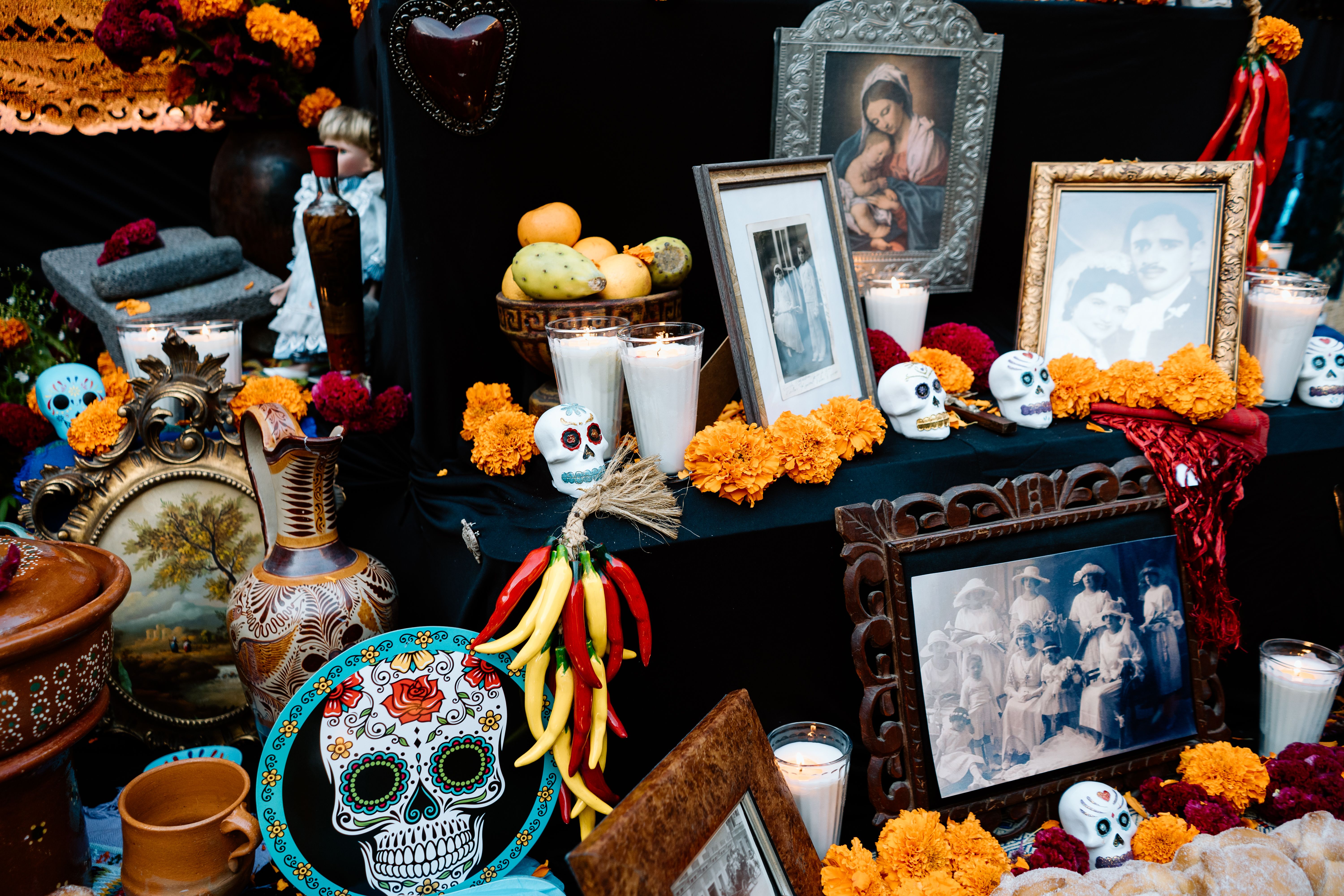 Flowers and Sugar Skulls on Ofrenda for Dia de Muertos · Free Stock Photo