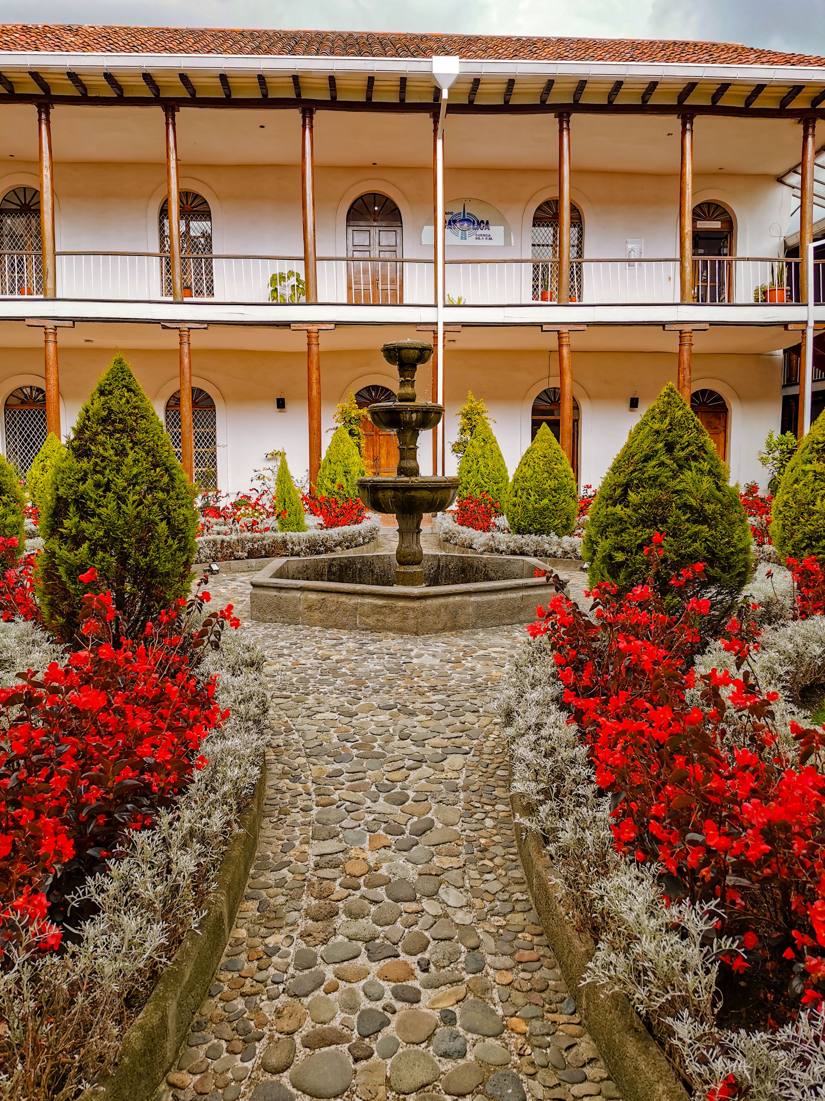 View of the Courtyard with Flowers and Water Fountain at a Mansion ...