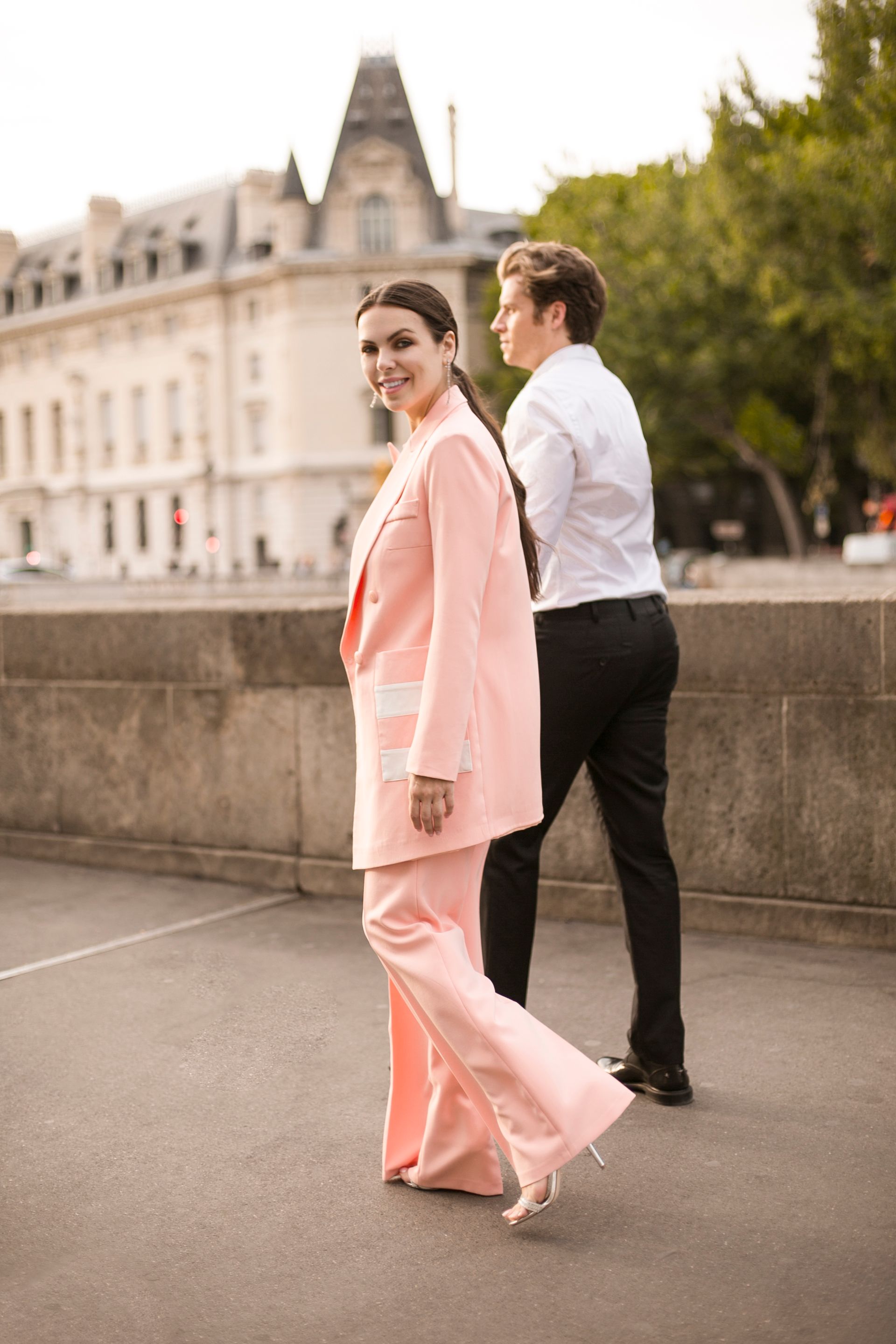 Elegant Couple Walking on the Pavement in City · Free Stock Photo