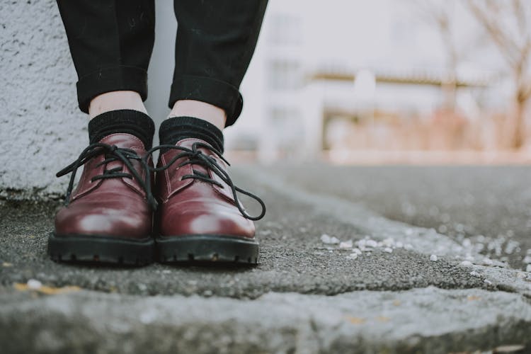 Person Wearing Leather Shoes 