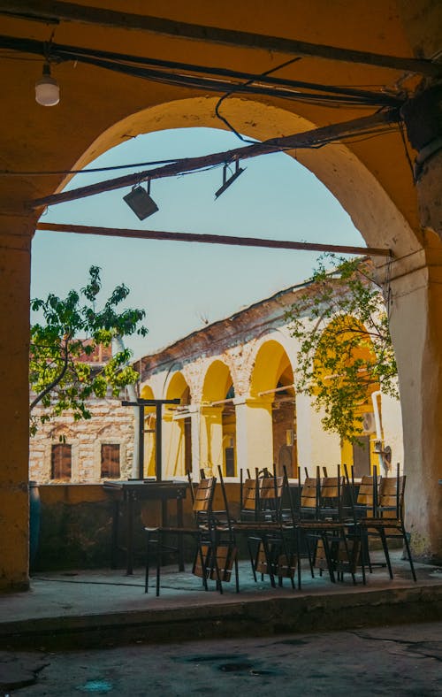 View of a Courtyard through an Arch 