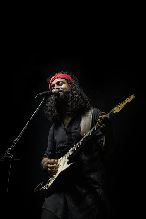 Singer in a dark stage