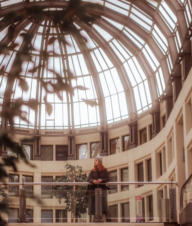 Woman Under Dome Windows