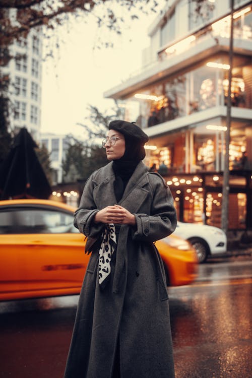 Portrait of Woman in Gray Coat