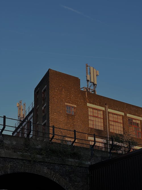 Brick Building with Telecommunication Antennas on Rooftop