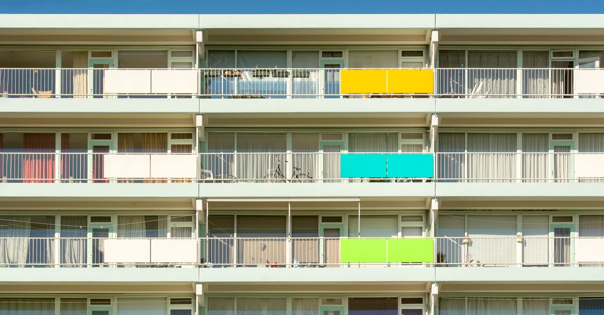 Vibrant multi-colored balconies decorate a modern apartment complex in Zoetermeer, Netherlands.