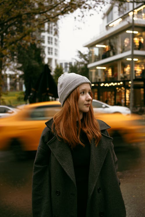 Young Beautiful Woman in Gray Beanie and Coat