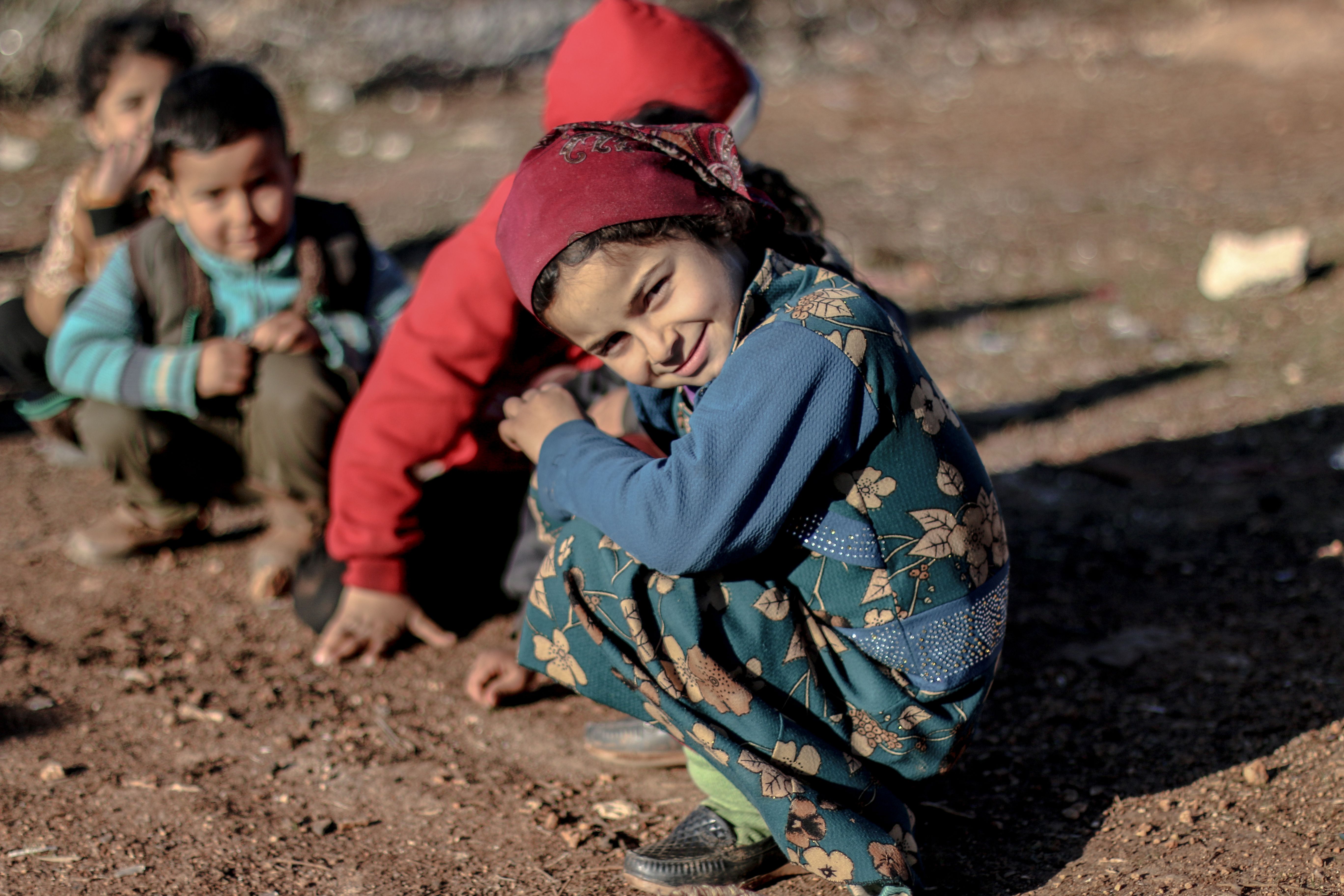 Children Playing Outside in the Mud · Free Stock Photo