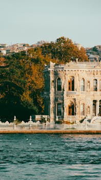 Discover the stunning architecture of Beylerbeyi Palace on the Bosphorus, bathed in autumn light.