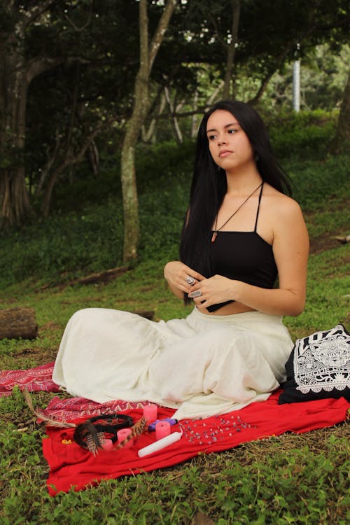 Brunette Woman Sitting on Picnic