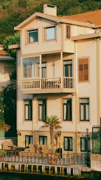 Beautiful multi-story house with a balcony, typical of Istanbul architecture.