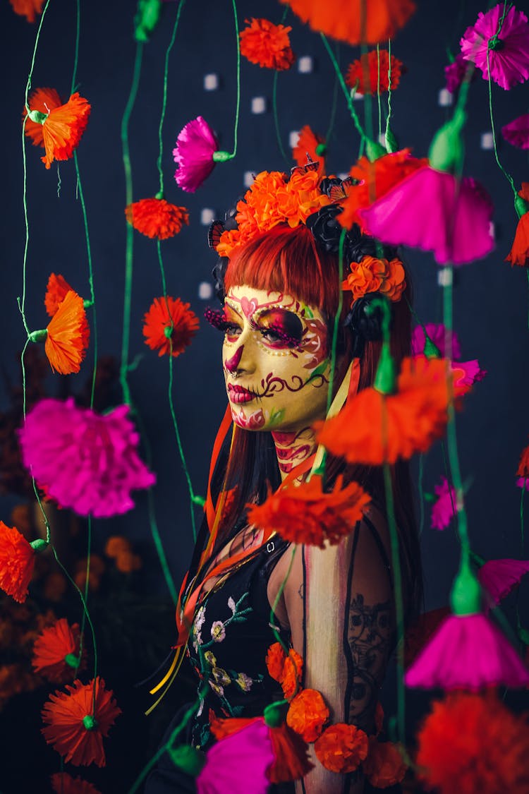 Catrina Standing Among Flowers