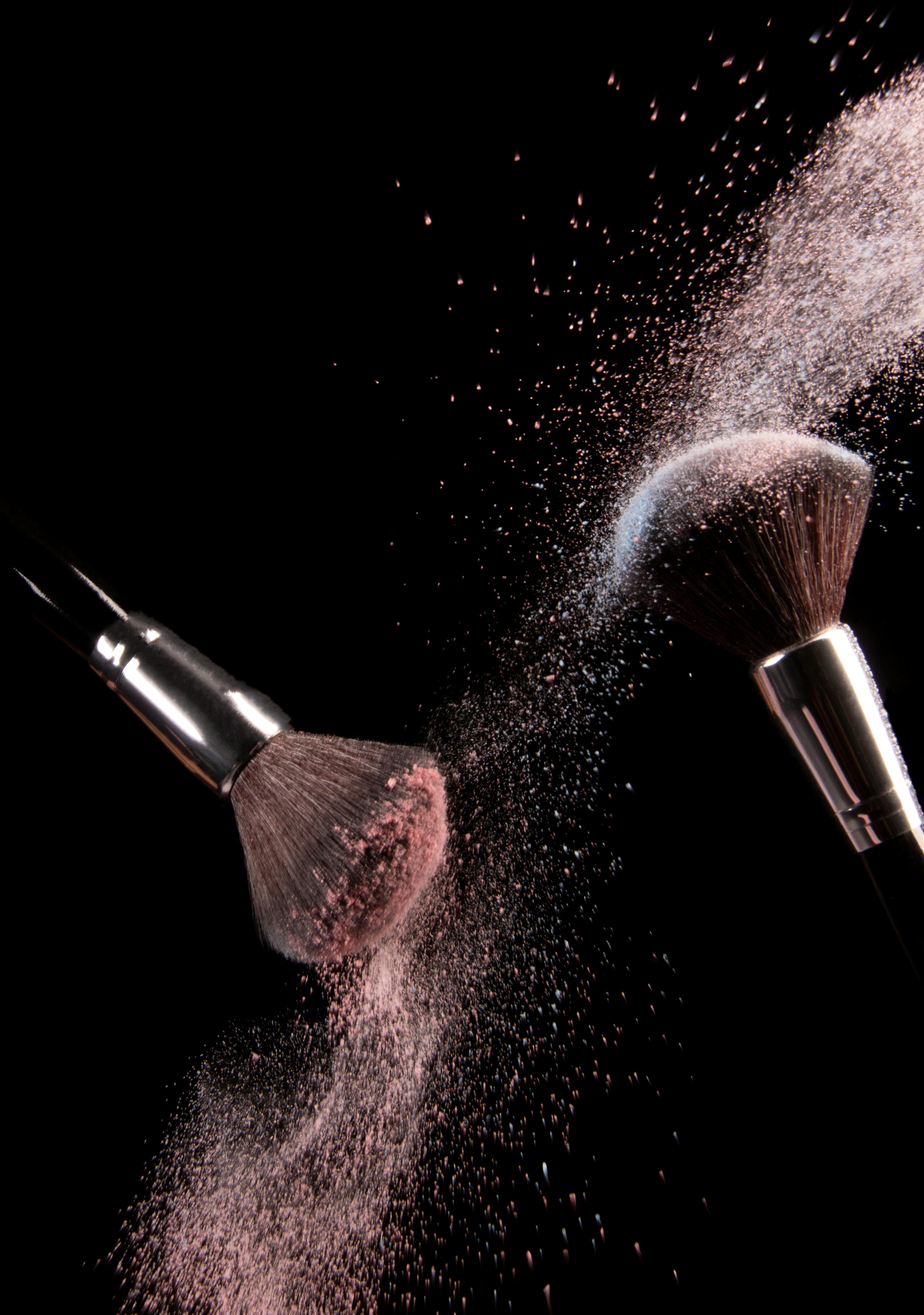 Cosmetics makeup brushes and powder