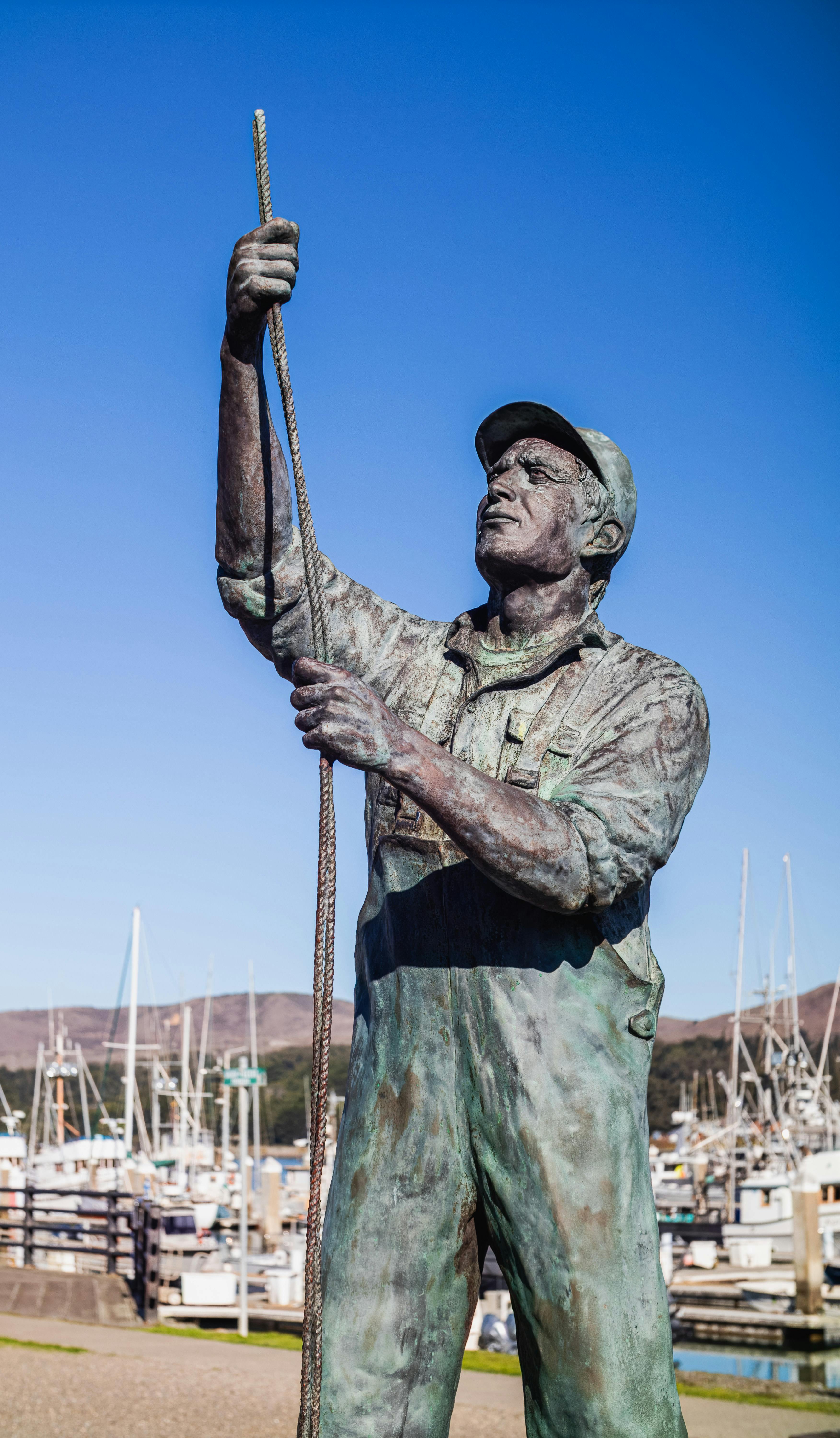 Man holding a fishing pole Stock Photo