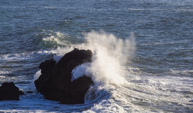 Wave Crushing On Rocks