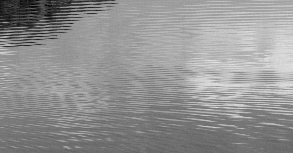 Lens Rippled Surface Rippled Surface of a Clear Lake · Free Stock Photo