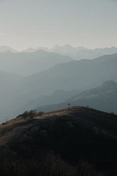 Peaceful landscape of Mottarone's serene mountain range under a clear sky.