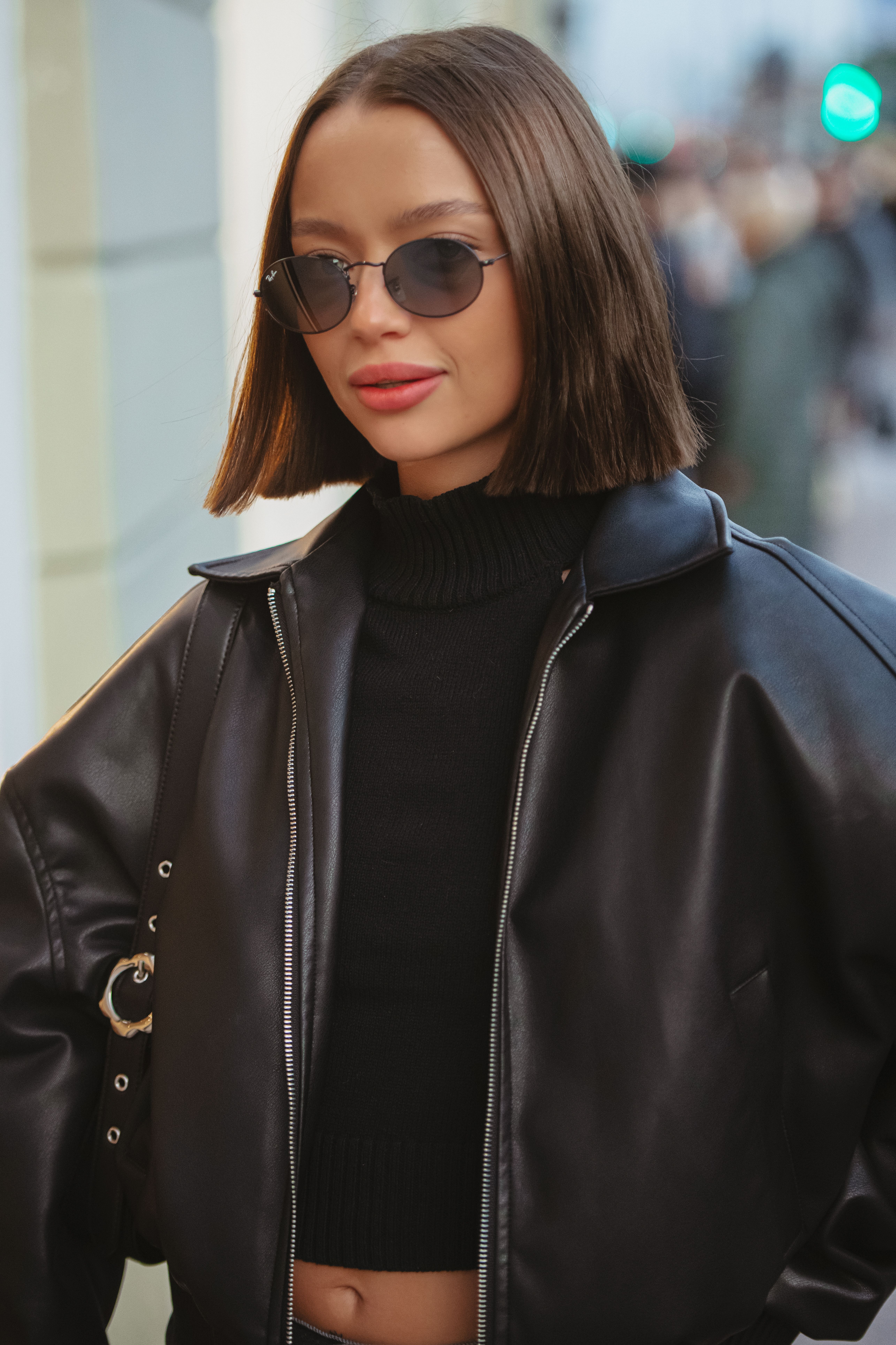 Portrait of Brunette Woman Wearing Leather Jacket · Free Stock Photo