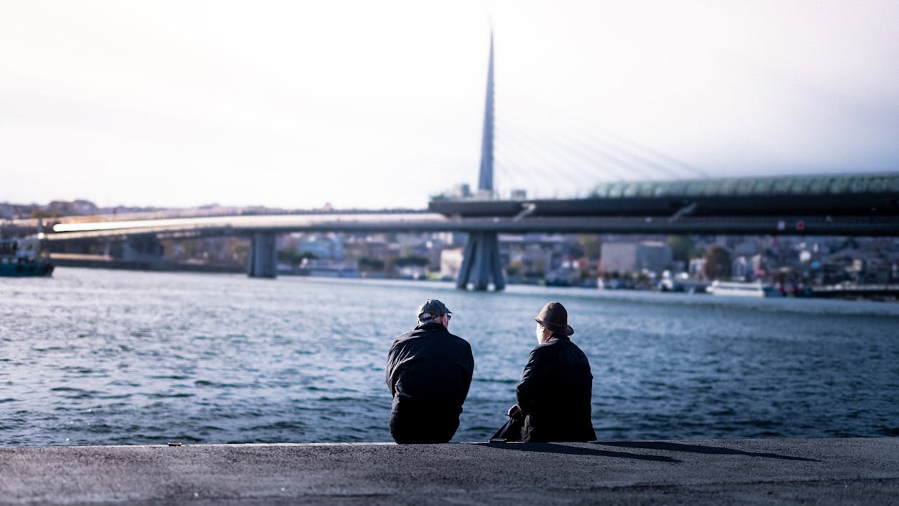 Elderly People Sitting on Sea Shore in Istanbul