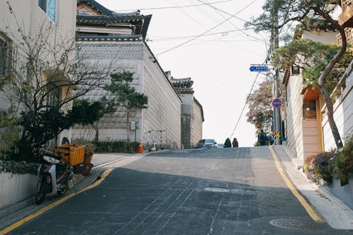 Kostnadsfri bild av byggnader, byn bukchon hanok, gata