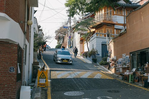 A Car on the Street in Bukchon Hanok Village in Seoul, South Korea