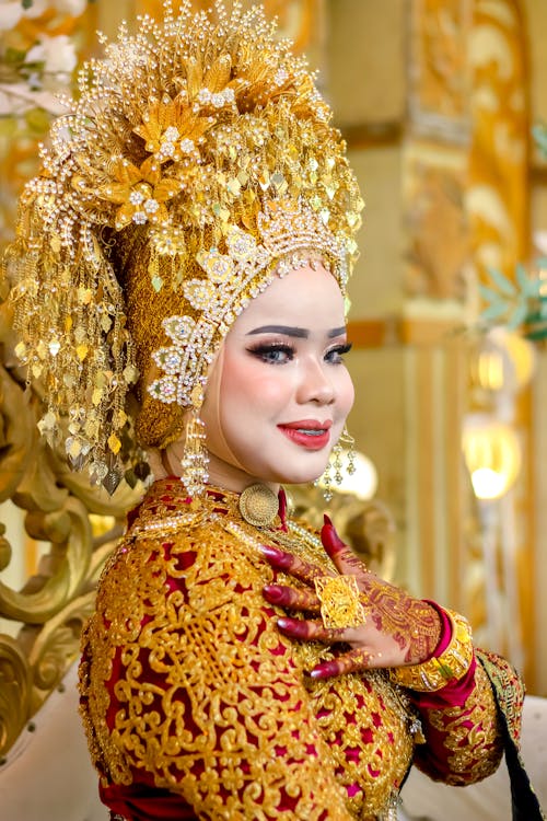 Bride in Golden Crown and Traditional Clothing
