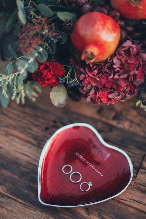 Free Heart-shaped Red and White Ceramic Saucer Stock Photo