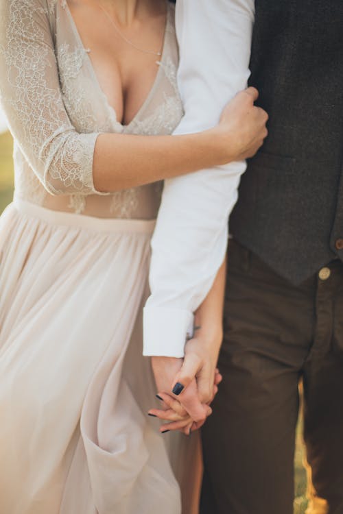 Free Man And Woman Holding Hands Stock Photo