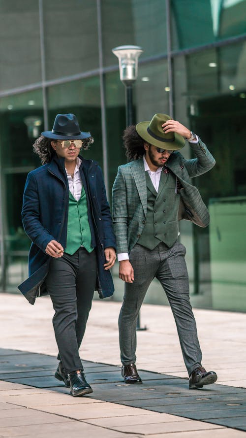 Men Walking in Hats and Suits