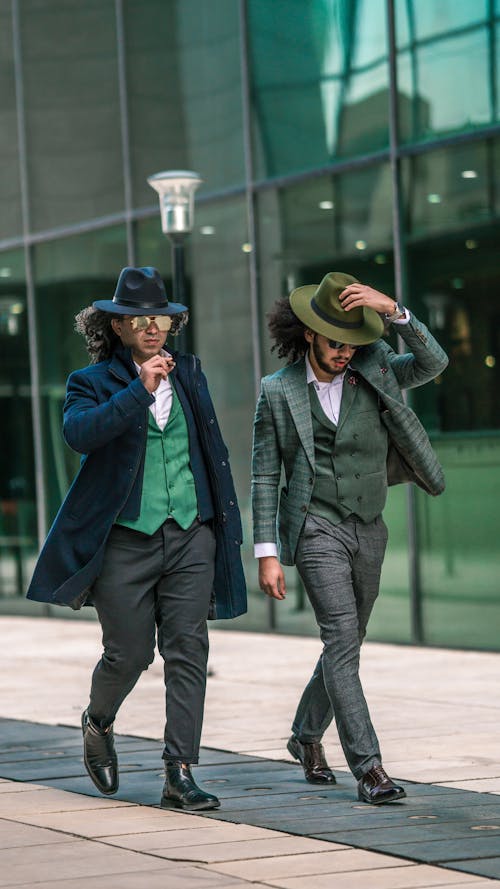 Men Walking in Suits and Hats