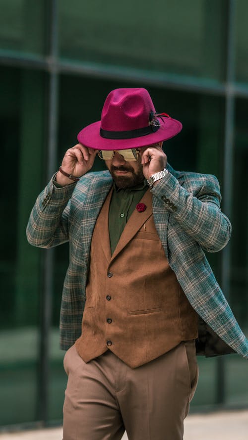 Portrait of Man in Pink Hat