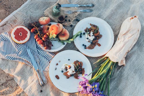 Flat Lay Photography of Cooked Meat and Sliced Vegetables