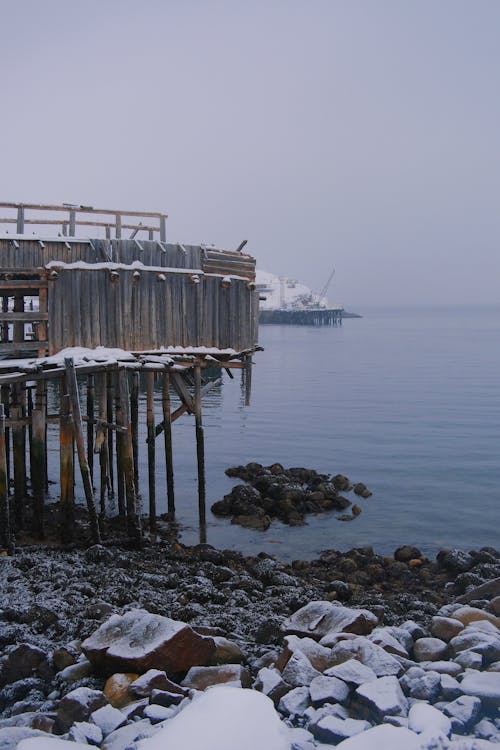 Wooden Pier by Sea in Winter