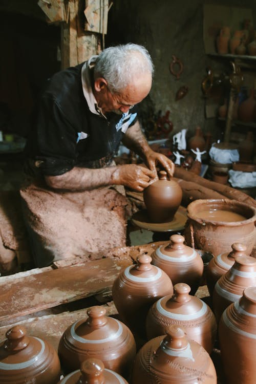 Elderly Man Making Pottery