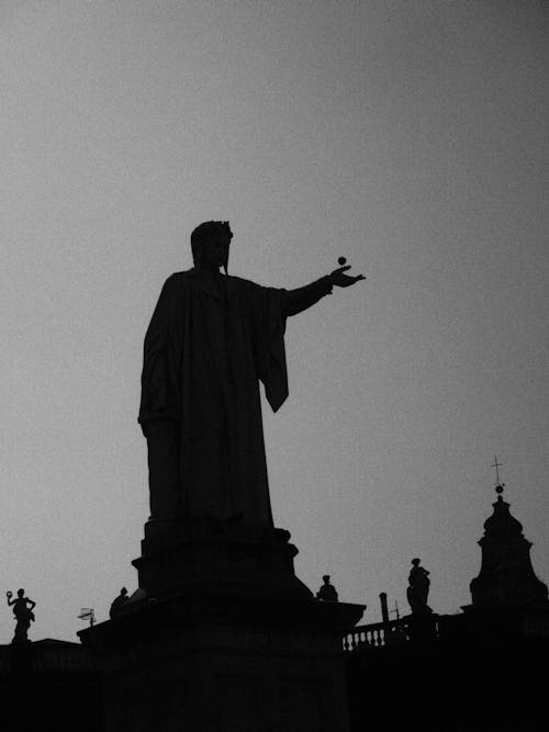 Silhouetted Sculptures against Clear Sky 