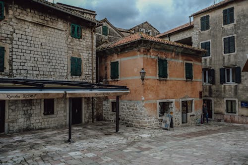 View of Old Buildings with Wooden Shutters in an Italian Town 
