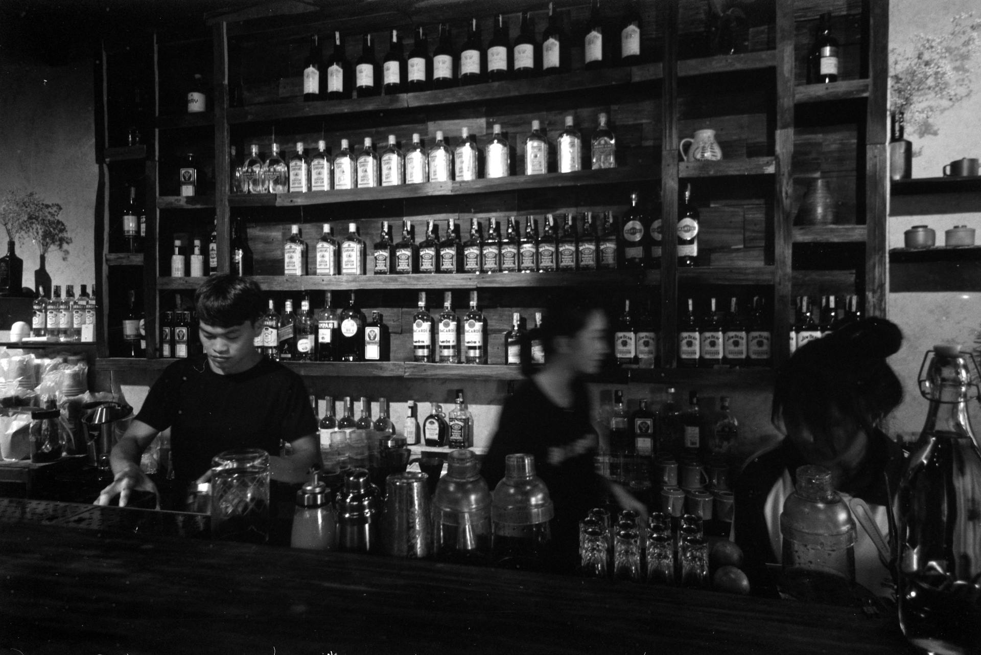 Bartenders at Work in Black and White