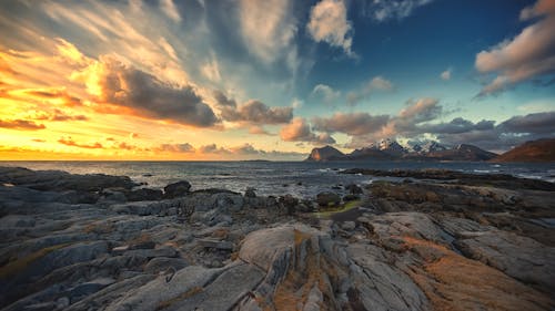 Seascape with a Rocky Shore, and Clouds in the Sky