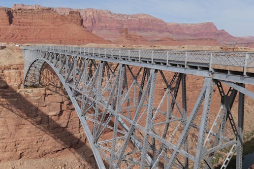 Metal Bridge over a Brown Canyon