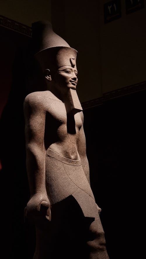 Egyptian Statue against a Black Background