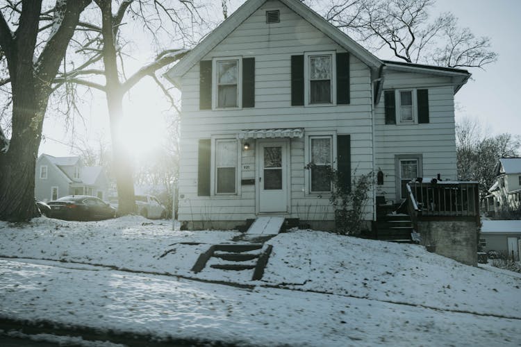 A Family House In The Suburbs In Winter 