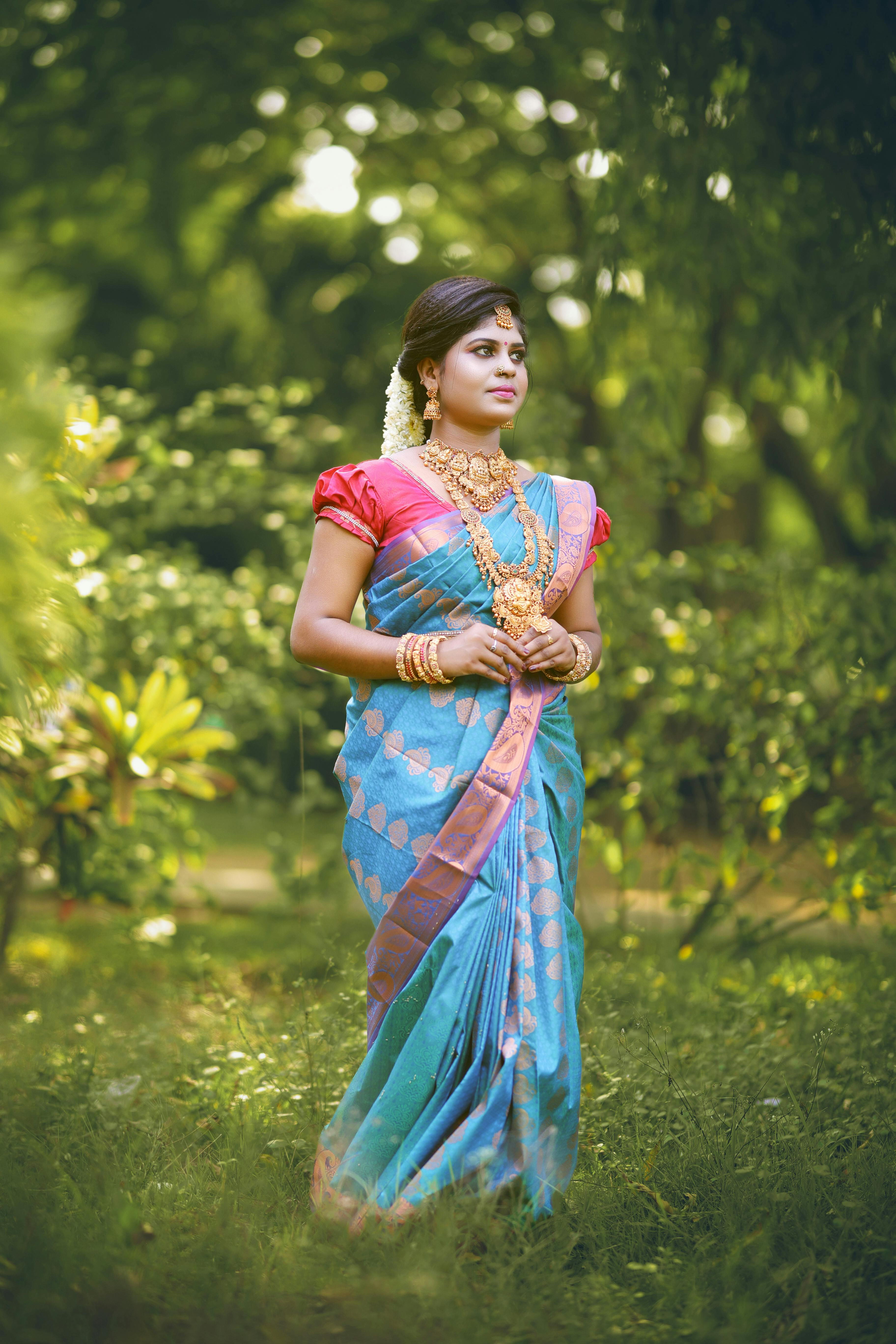 Beautiful Indian Young Girl In Traditional Saree Posing Outdoors Stock Photo,  Picture and Royalty Free Image. Image 147638535.