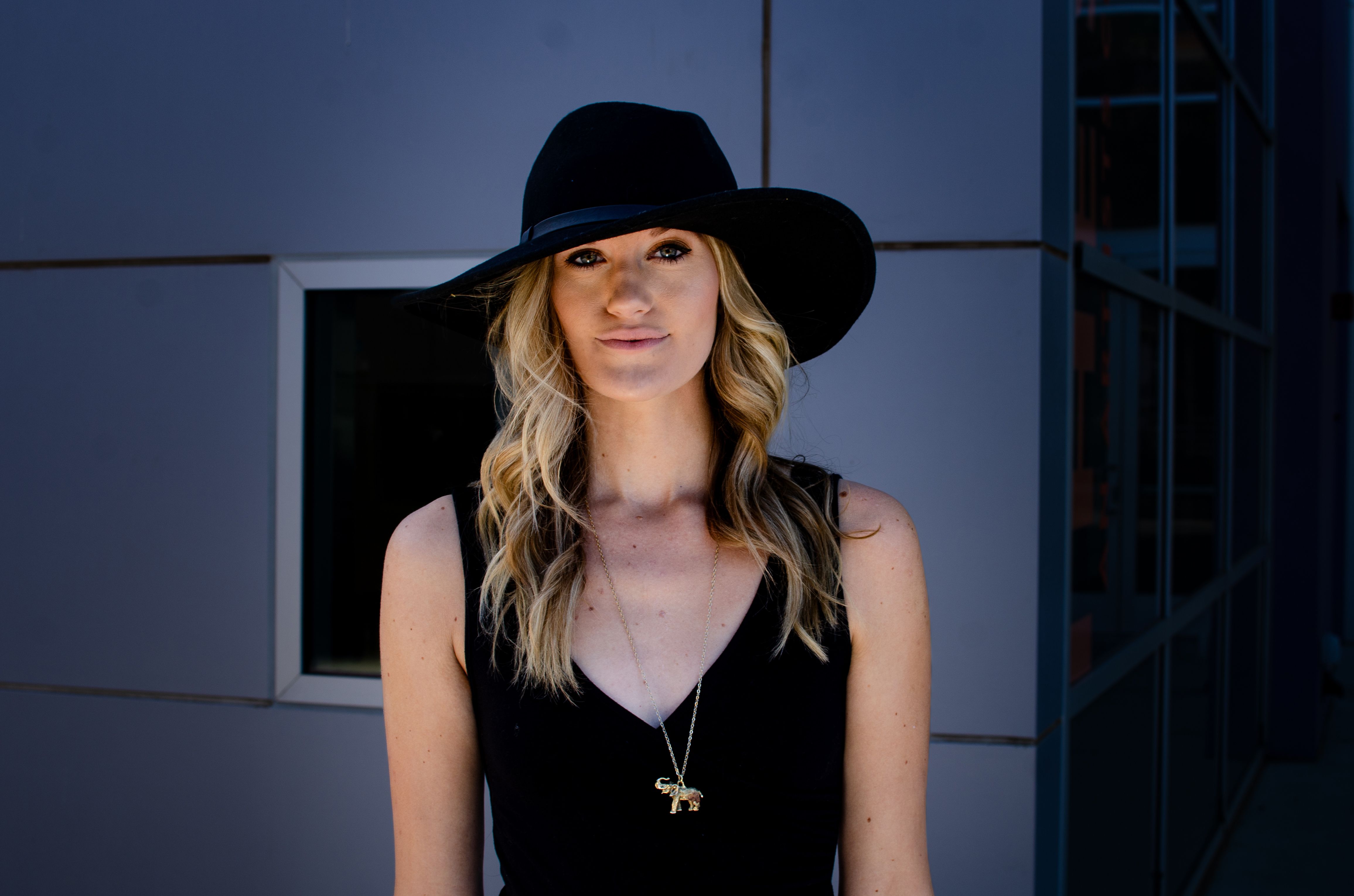 Blonde Woman Wearing a Black Hat · Free Stock Photo