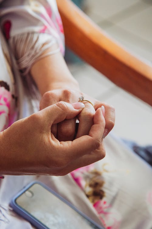 Free Close-up of Woman Touching Her Engagement Ring  Stock Photo