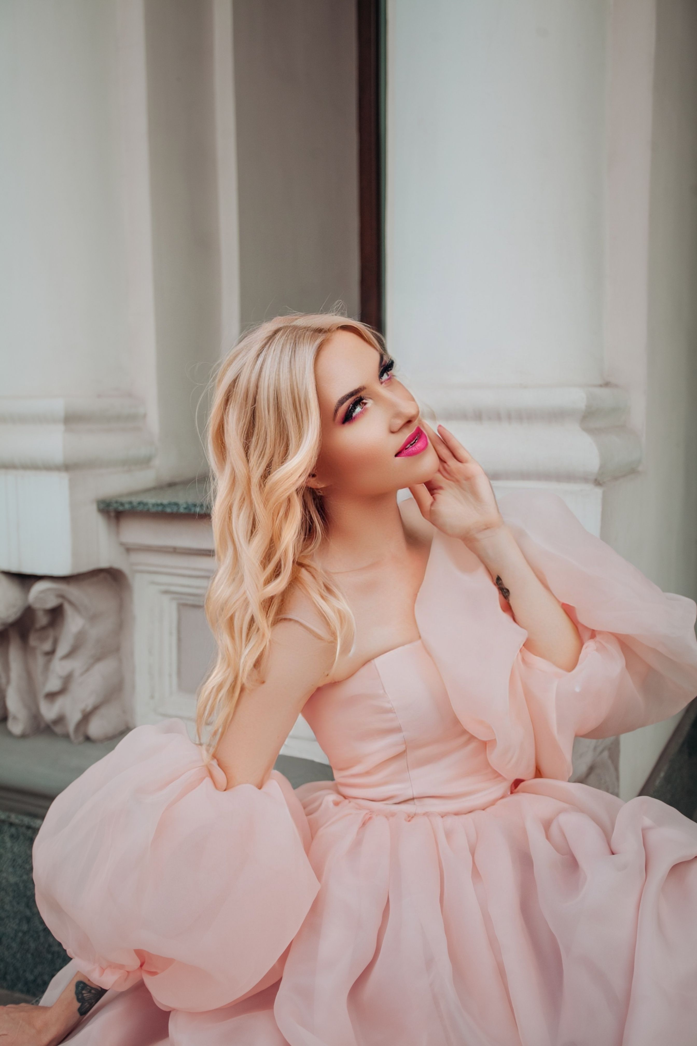 A beautiful blonde woman in a pink dress  Free Stock Photo