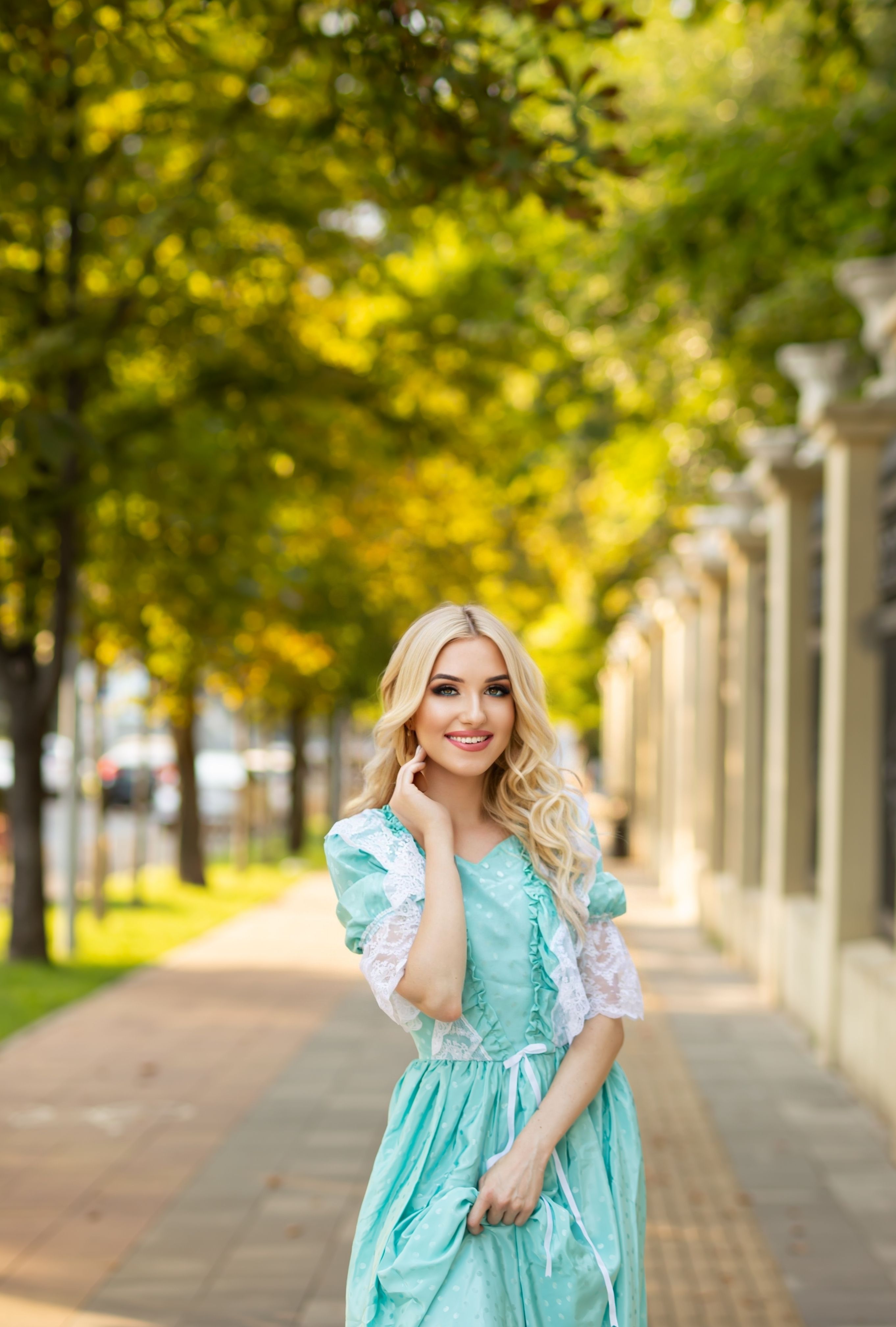 blue dress with blonde hair Gorgeous Blonde In Blue Dress Standing Outdoors Stock Photo - Download  Image Now - 18-19 Years, Adult, Adults Only