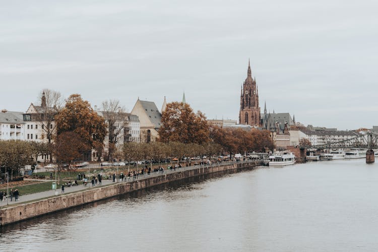 Crowd Of Passersby On The Promenade Along The Main In Frankfurt