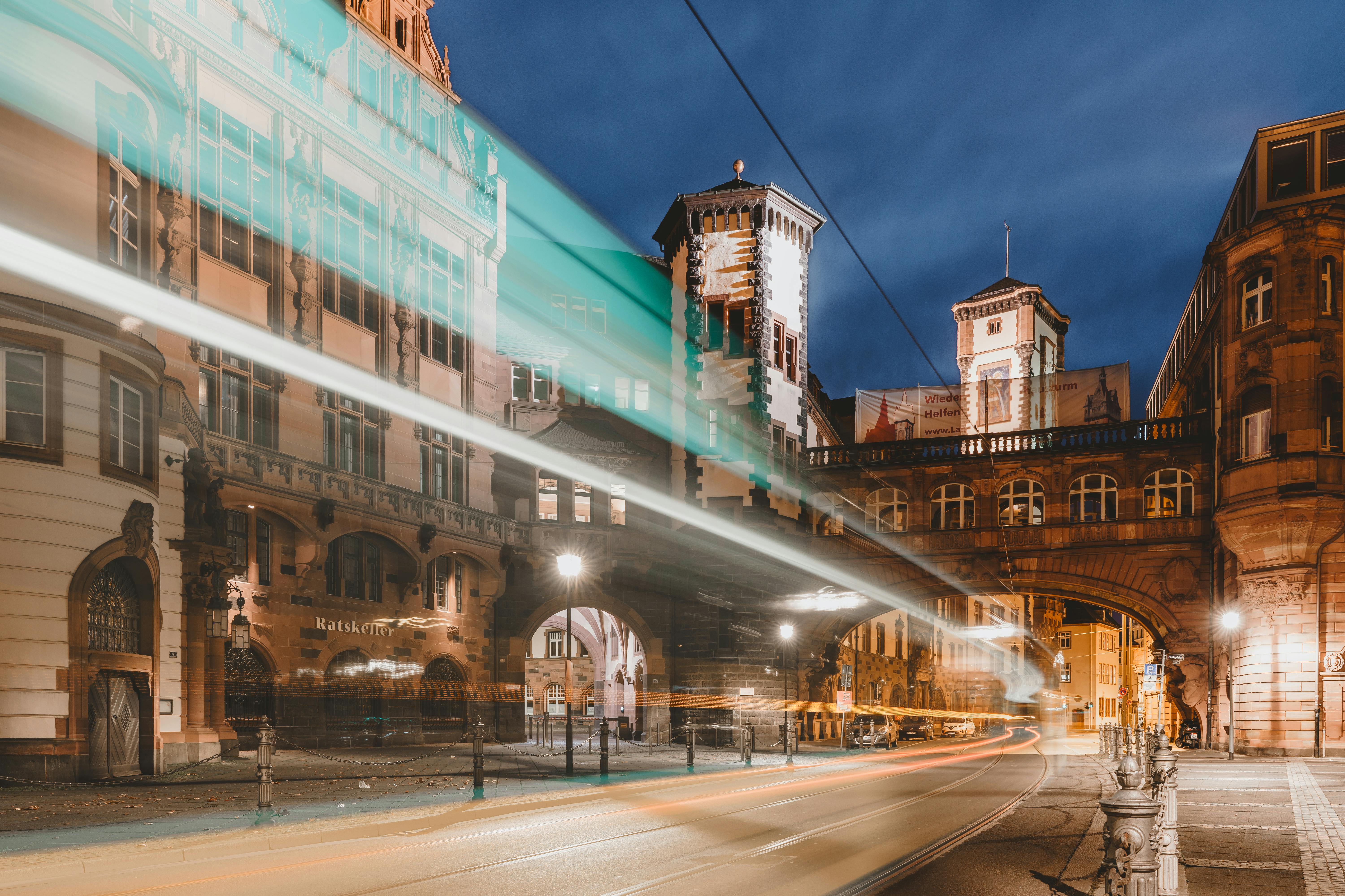 Streaks of Car Lights on Time Lapse of Traffic on the Street of Frankfurt Old Town at Night